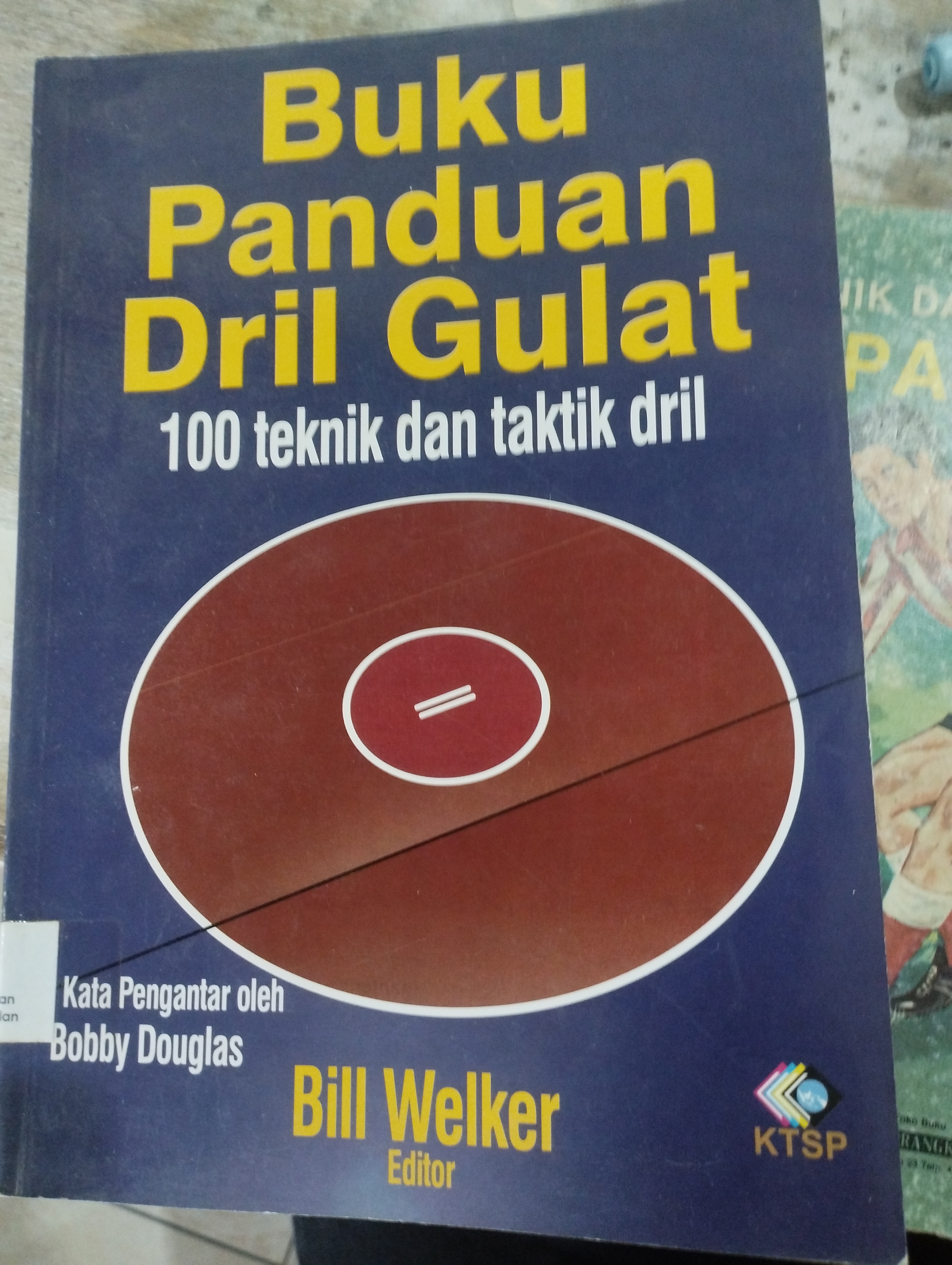 Buku Panduan Dril Gulat 100 Teknik dan Taktik Dril